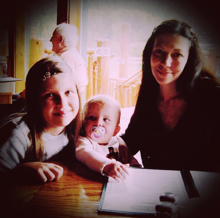 Photograph of Galina Nelson with her daughters, around the year 2008